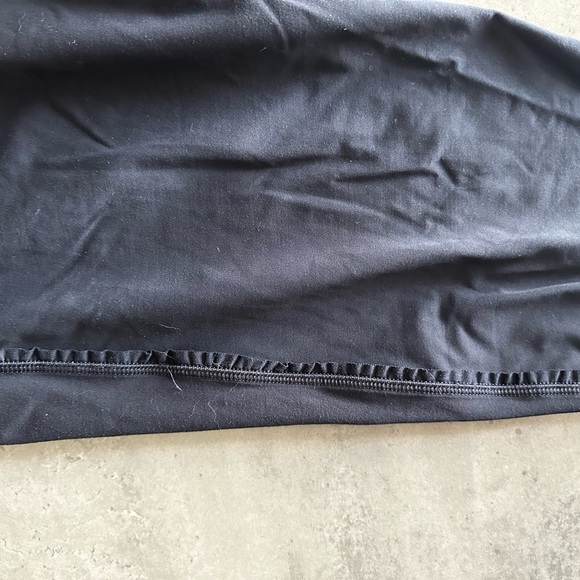 Lululemon Pink and Black Athletic Leggings with Stretchy Fabric - Picture 7 of 9